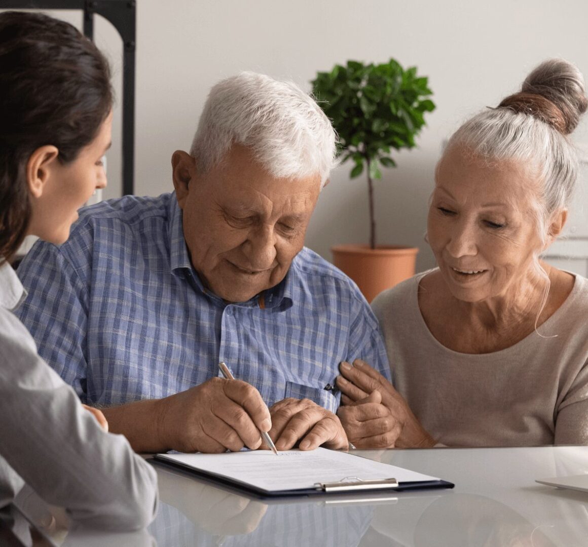 Friendly staff assisting seniors in modern board and care homes.